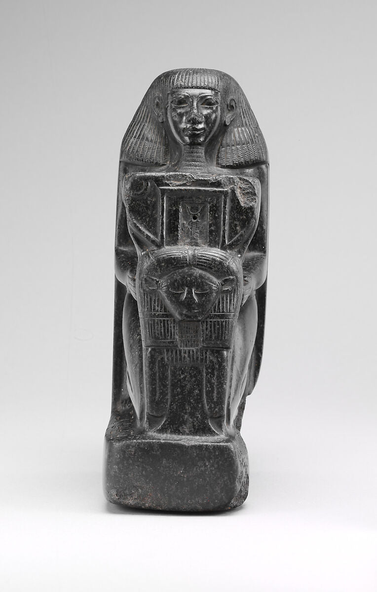 Statue of Senenmut holding a sistrum, Dynasty 18, The Metropolitan Museum of Art, public domain